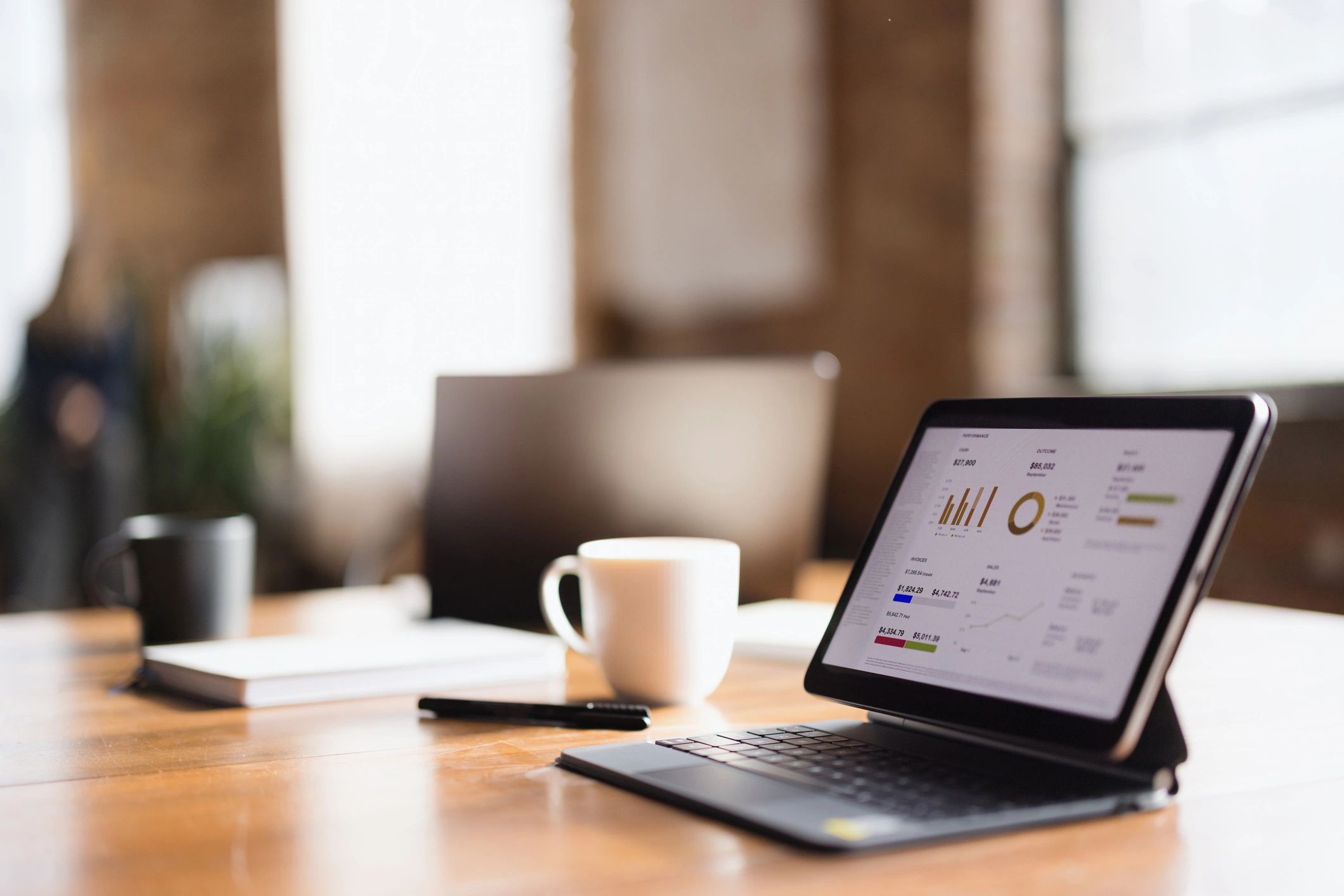 Tablet showing business analytics and review performance